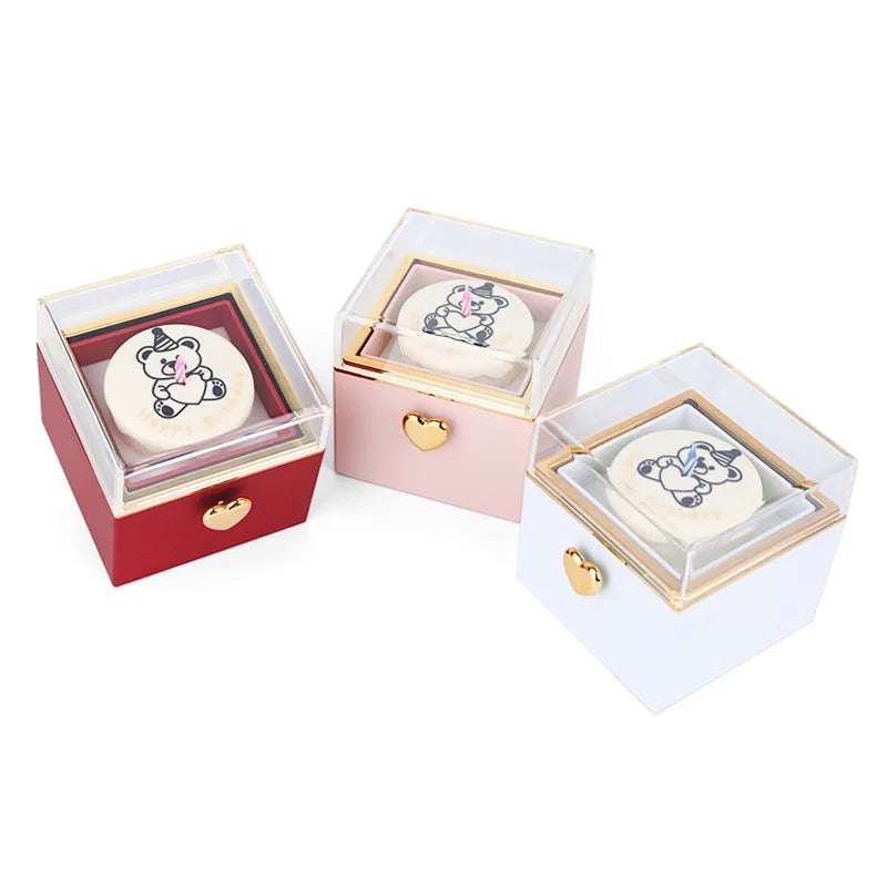 Cute unicorn bear-themed gift boxes in red, pink, white with gold heart clasps, perfect for unique gifts