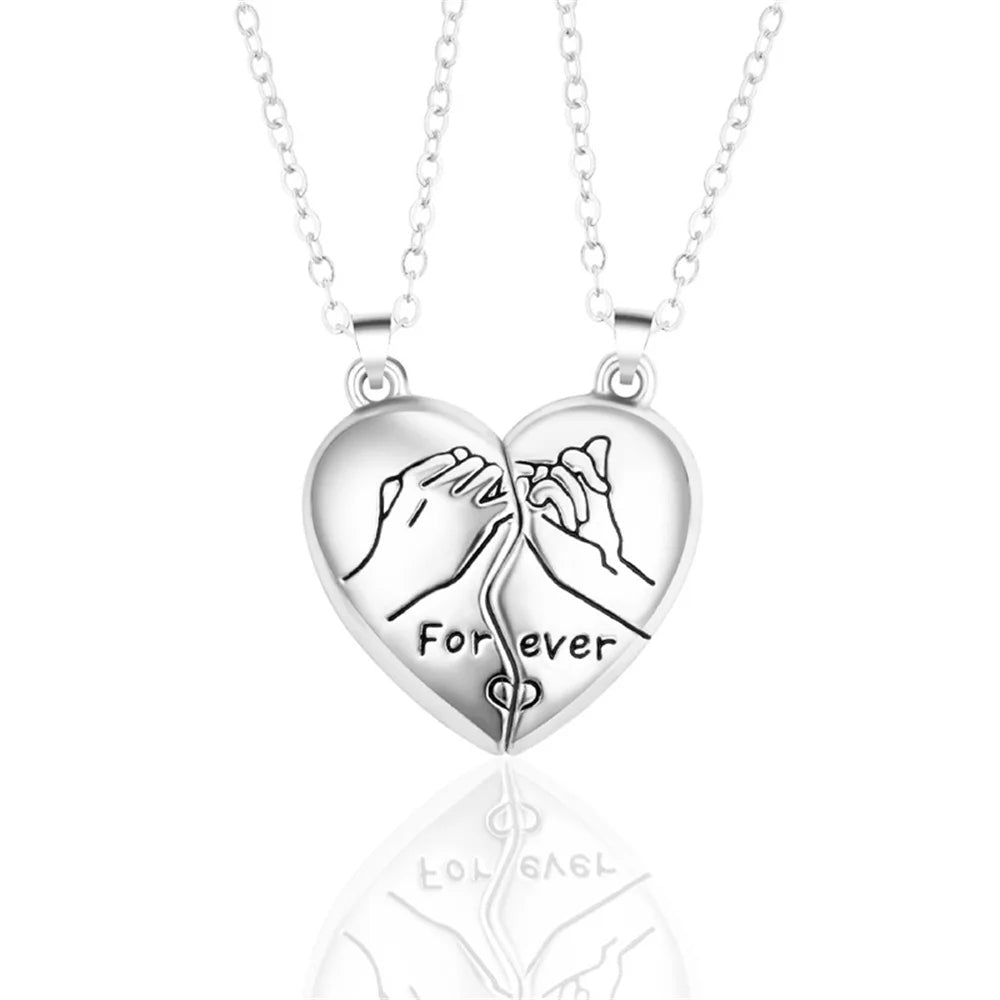 Silver magnetic heart necklace for couples with matching design
