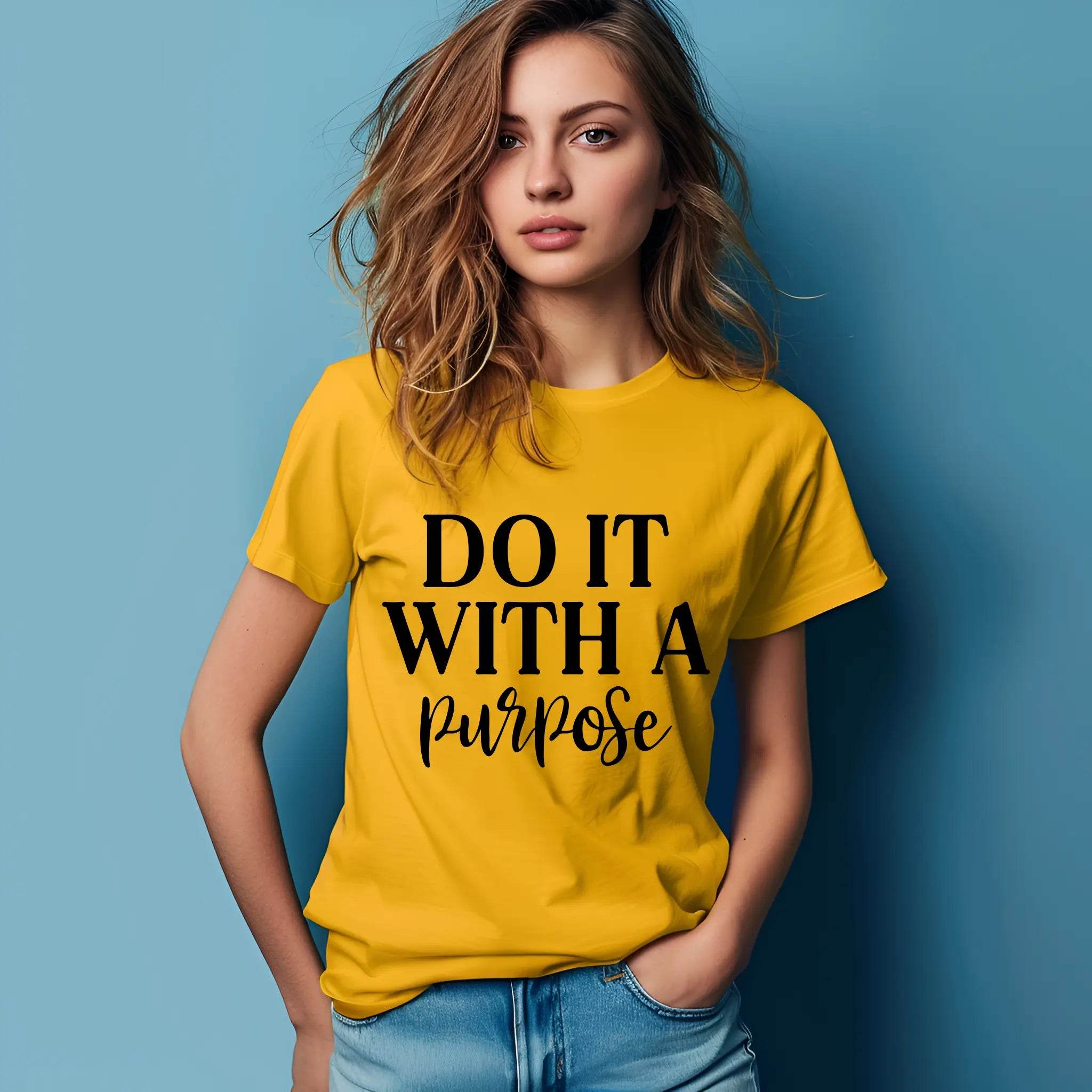 Woman wearing a yellow t-shirt with 'DO IT WITH A PURPOSE' text against a blue background