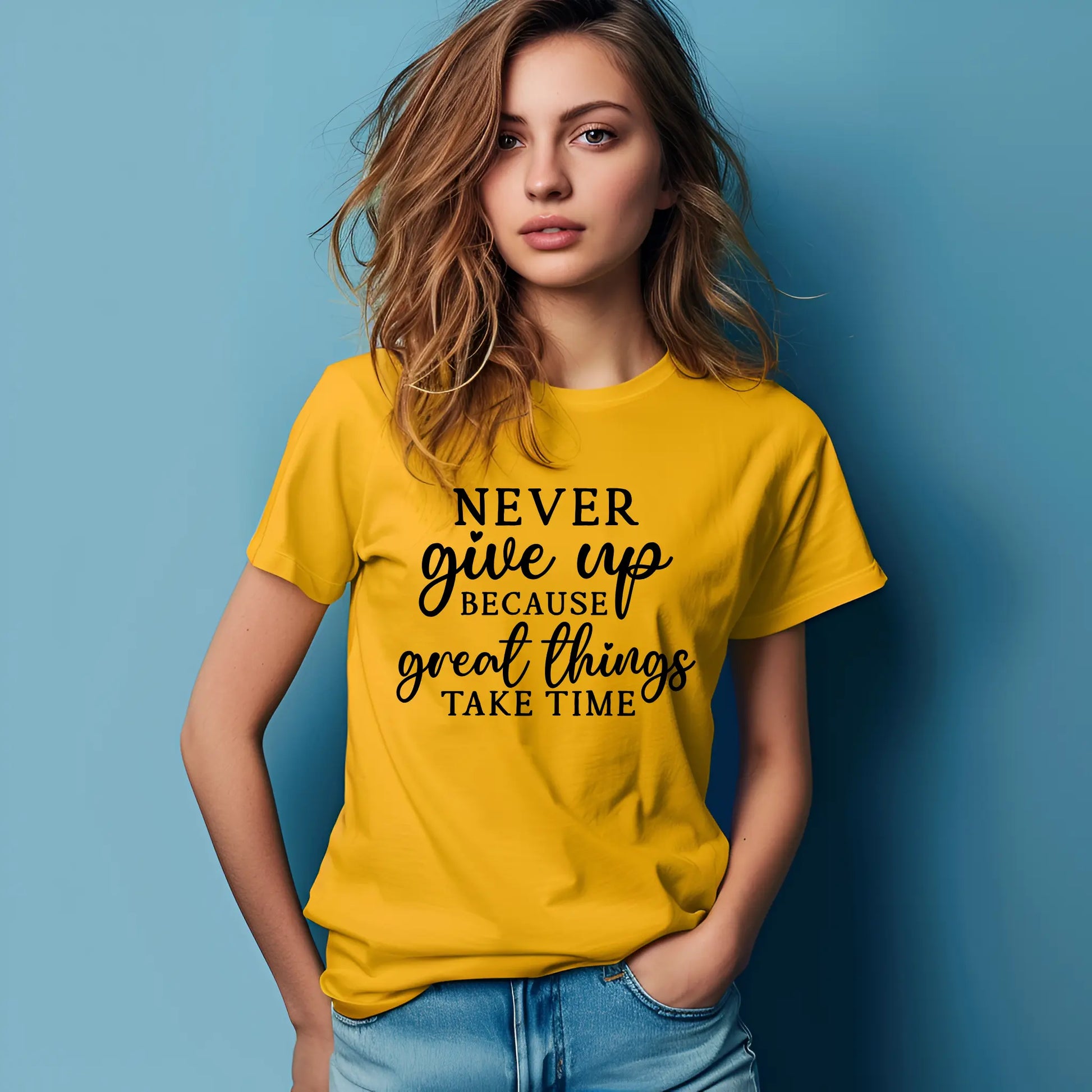 Woman wearing a yellow t-shirt with a motivational quote against a blue background