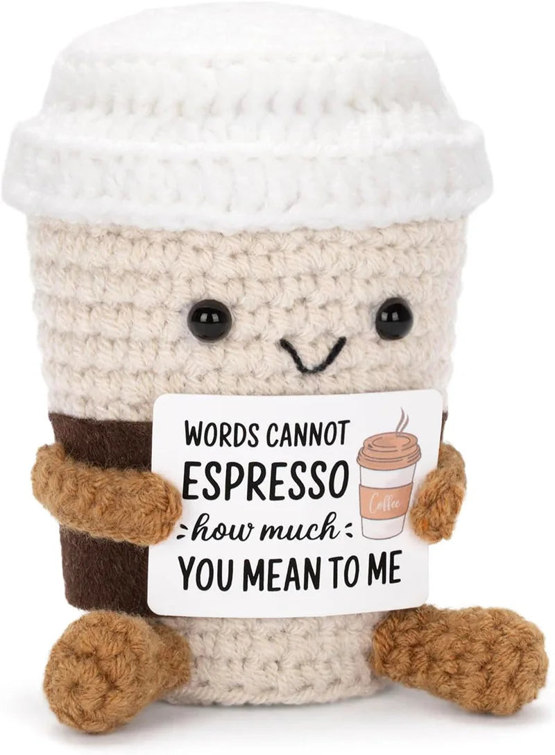 Crocheted coffee cup plushie holding 'Words Cannot Espresso How Much You Mean To Me' sign, cute gift for coffee lovers