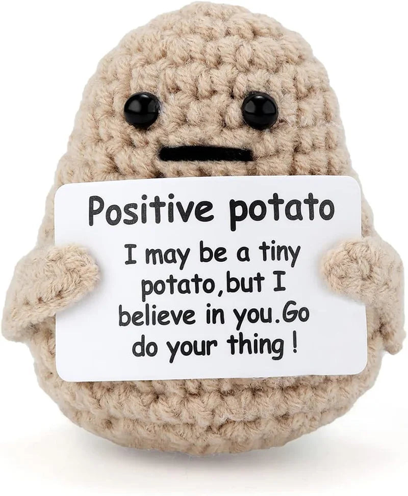 Crocheted positive potato plush holding motivational sign, cute home decor gift